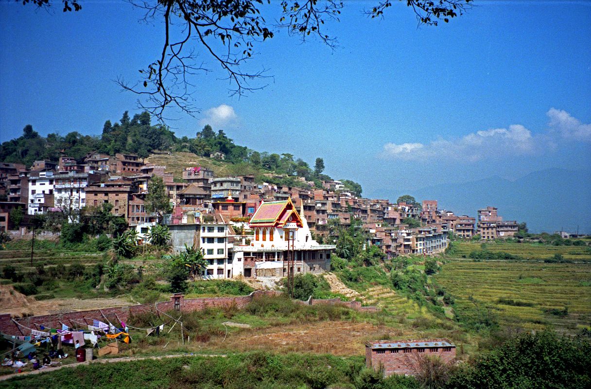 Kathmandu Valley 2 Kirtipur 01 Kiritpur On Hill And Srikirti Vihara The small town of Kirtipur is on two hills with a saddle between them, 5km southwest of Kathmandu. Srikirti Vihara, a Thai Buddhist temple, is visible on the edge of the village.